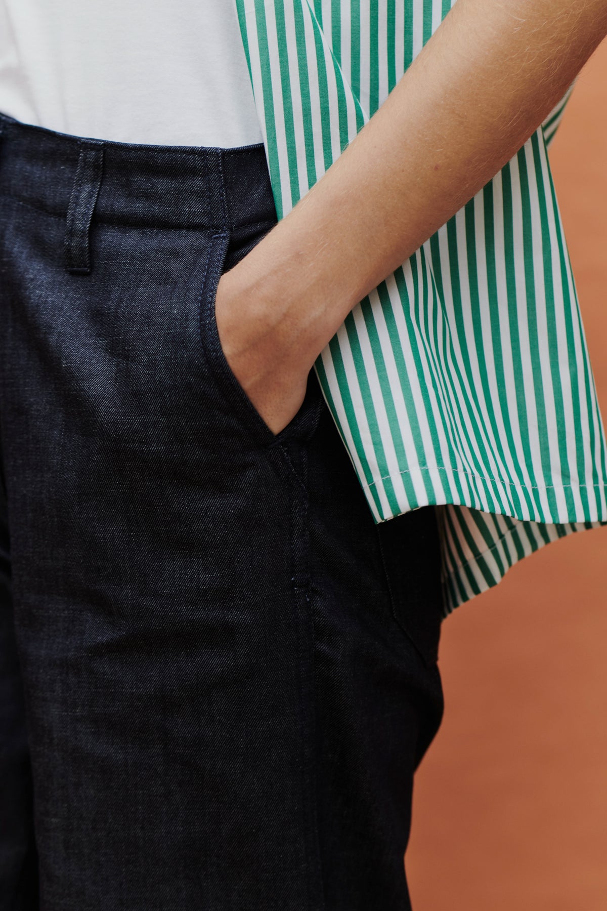 close up detail shot of hand in a pocket 