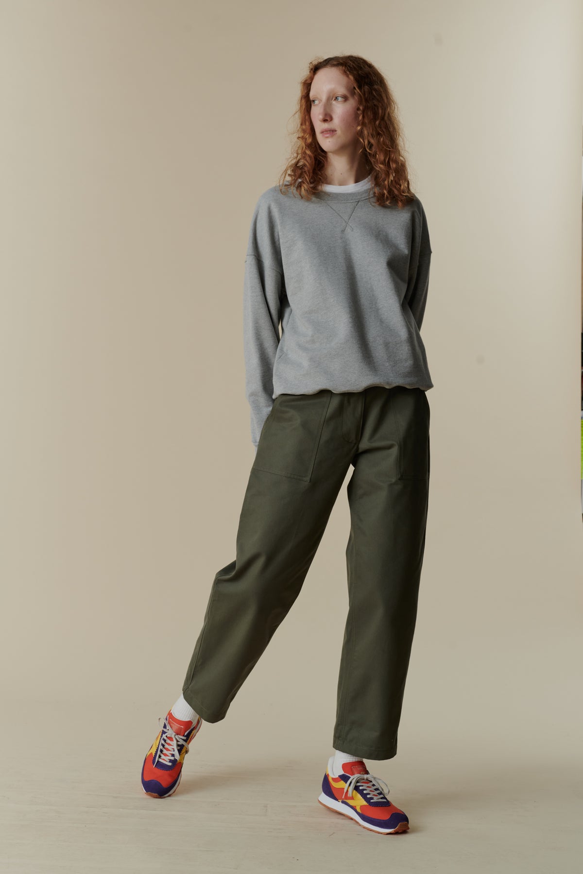Full body image of female in combat trouser olive