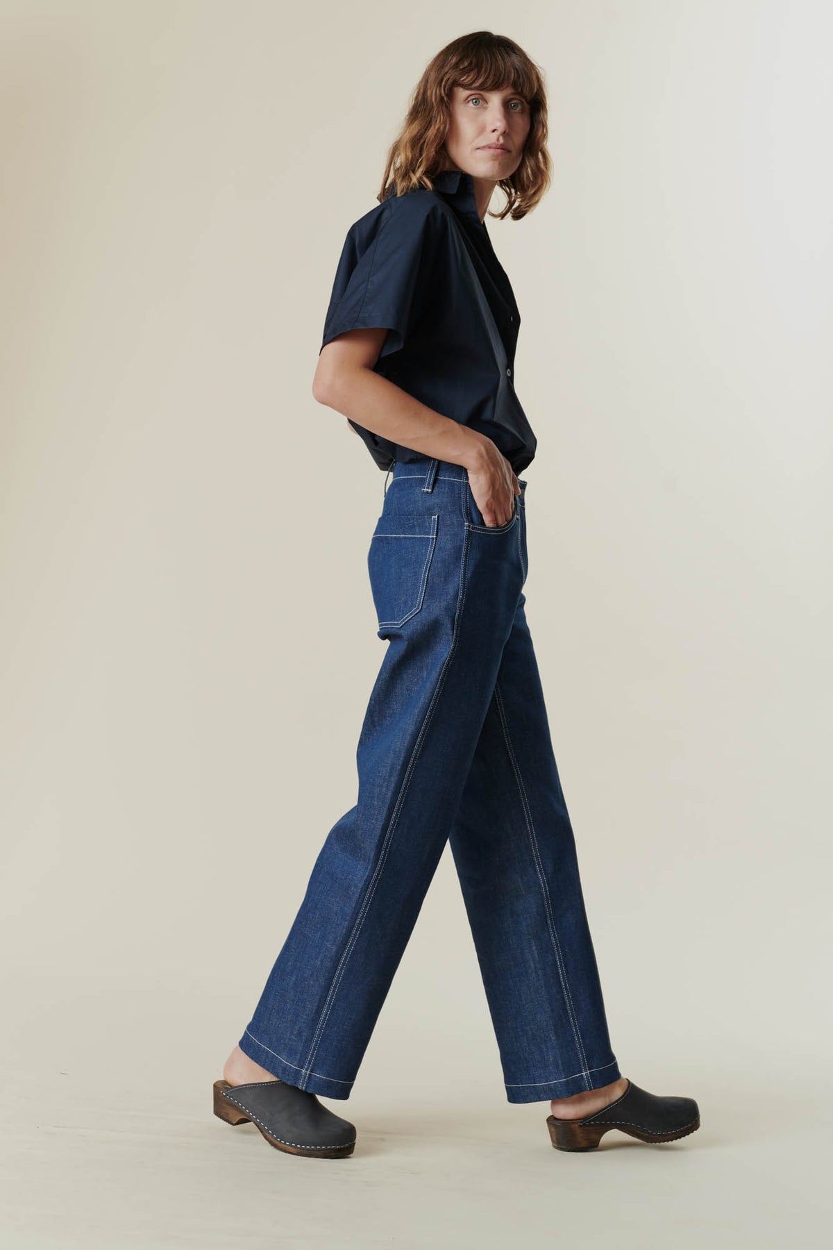 Female wearing work jean in blue