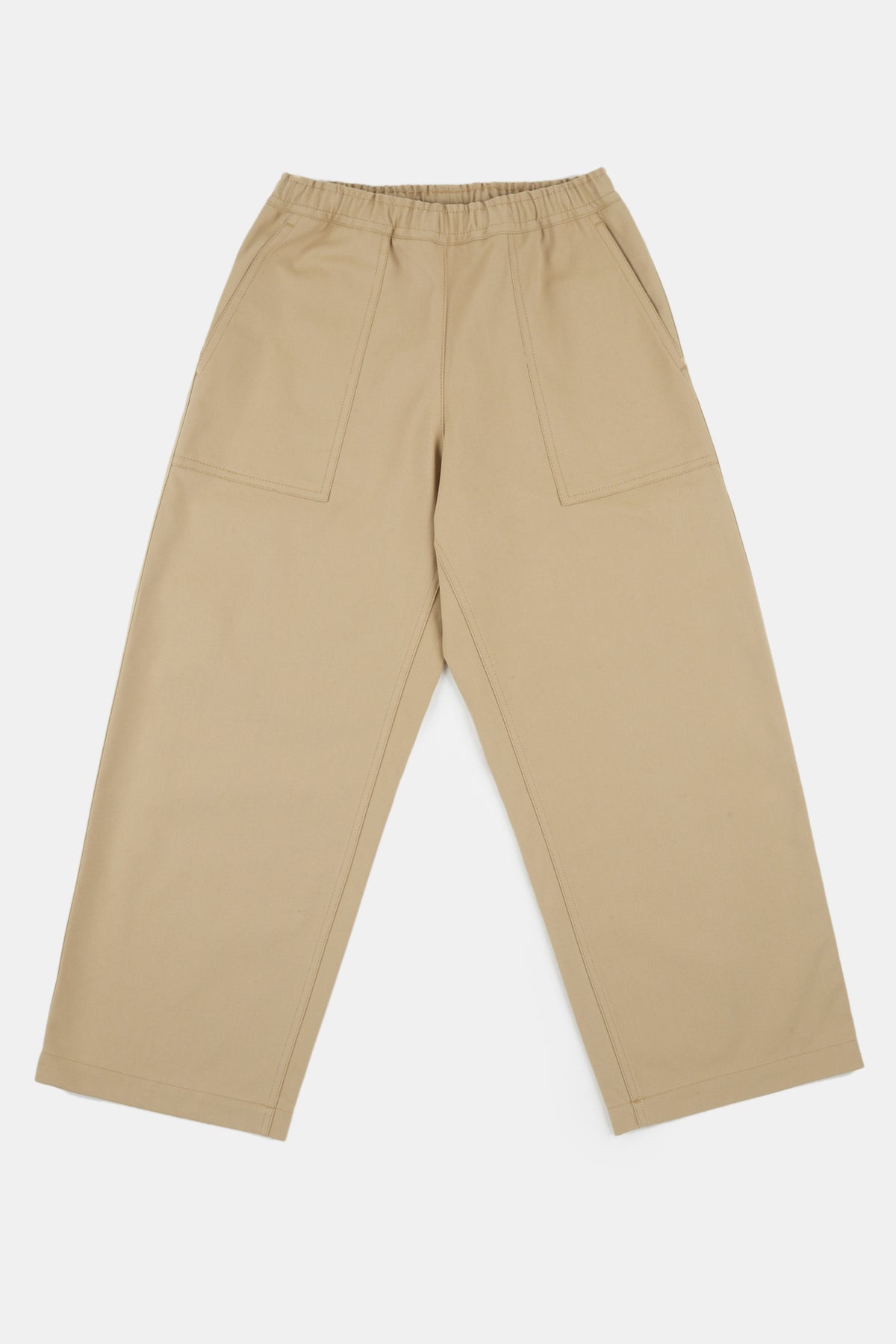 Flatlay image of camerawoman drawstring tapered cotton canvas trousers in putty 