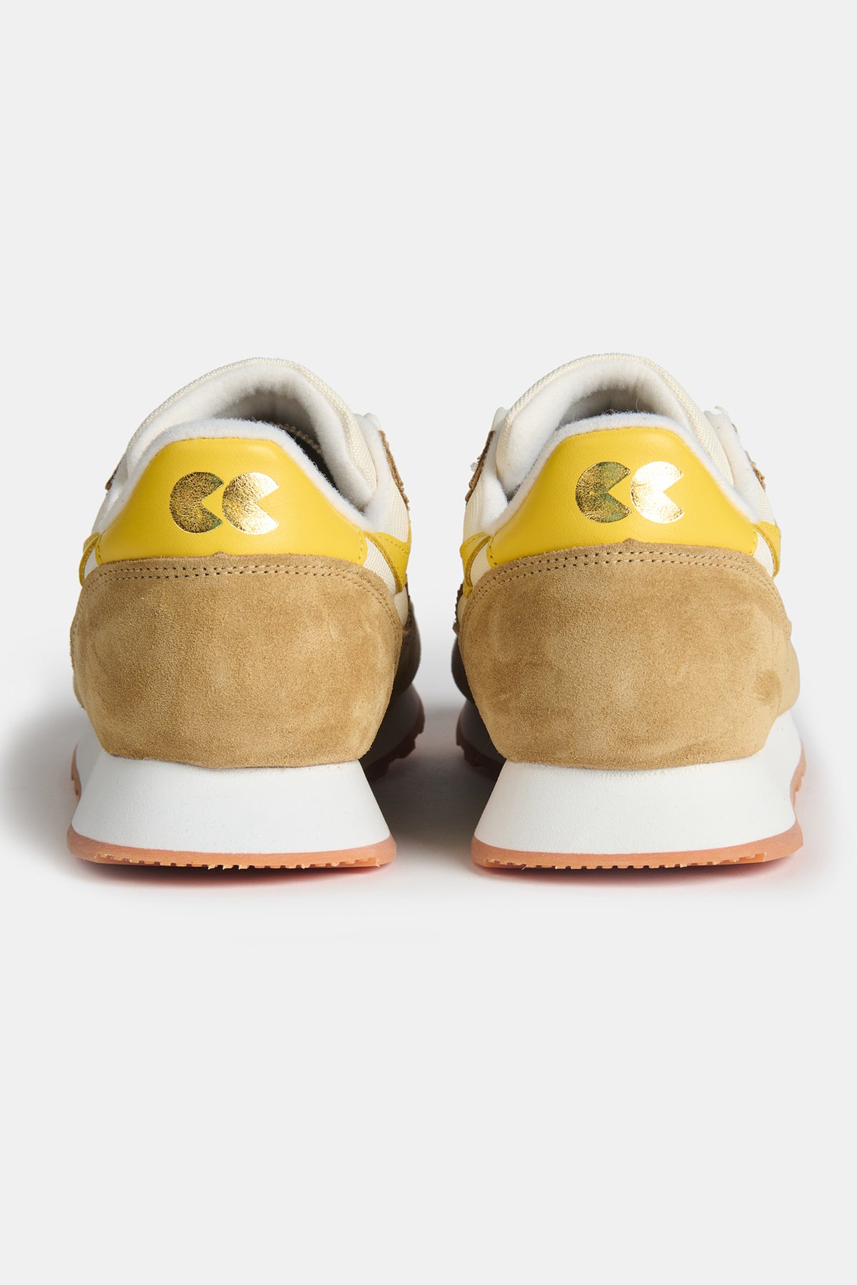 The heel of Walsh X CC Parlick trainers in Ivory/Tan/Daffodil with CC logo on the heel