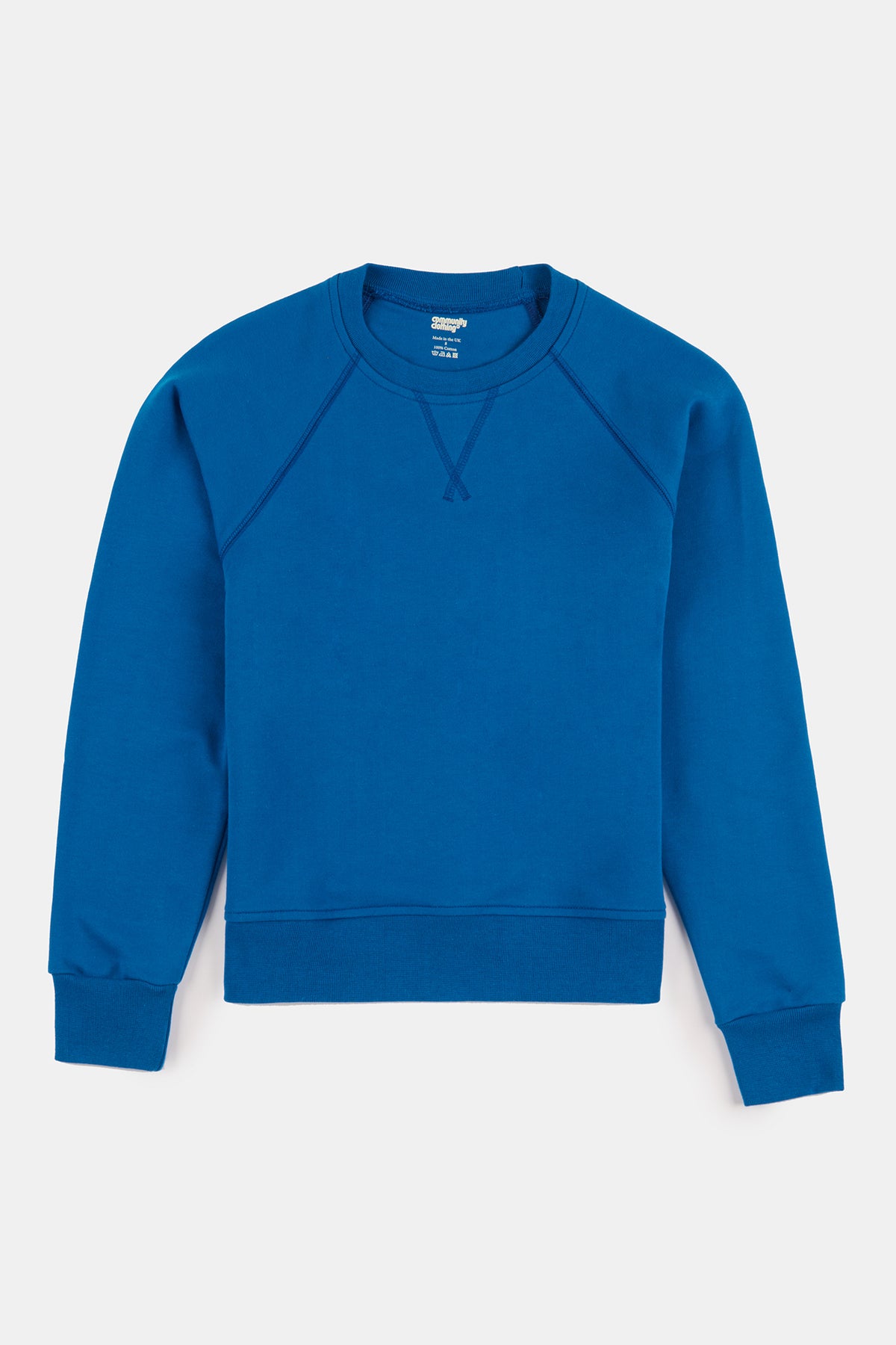 Flatlay product shot of women's raglan sweatshirt in cobalt