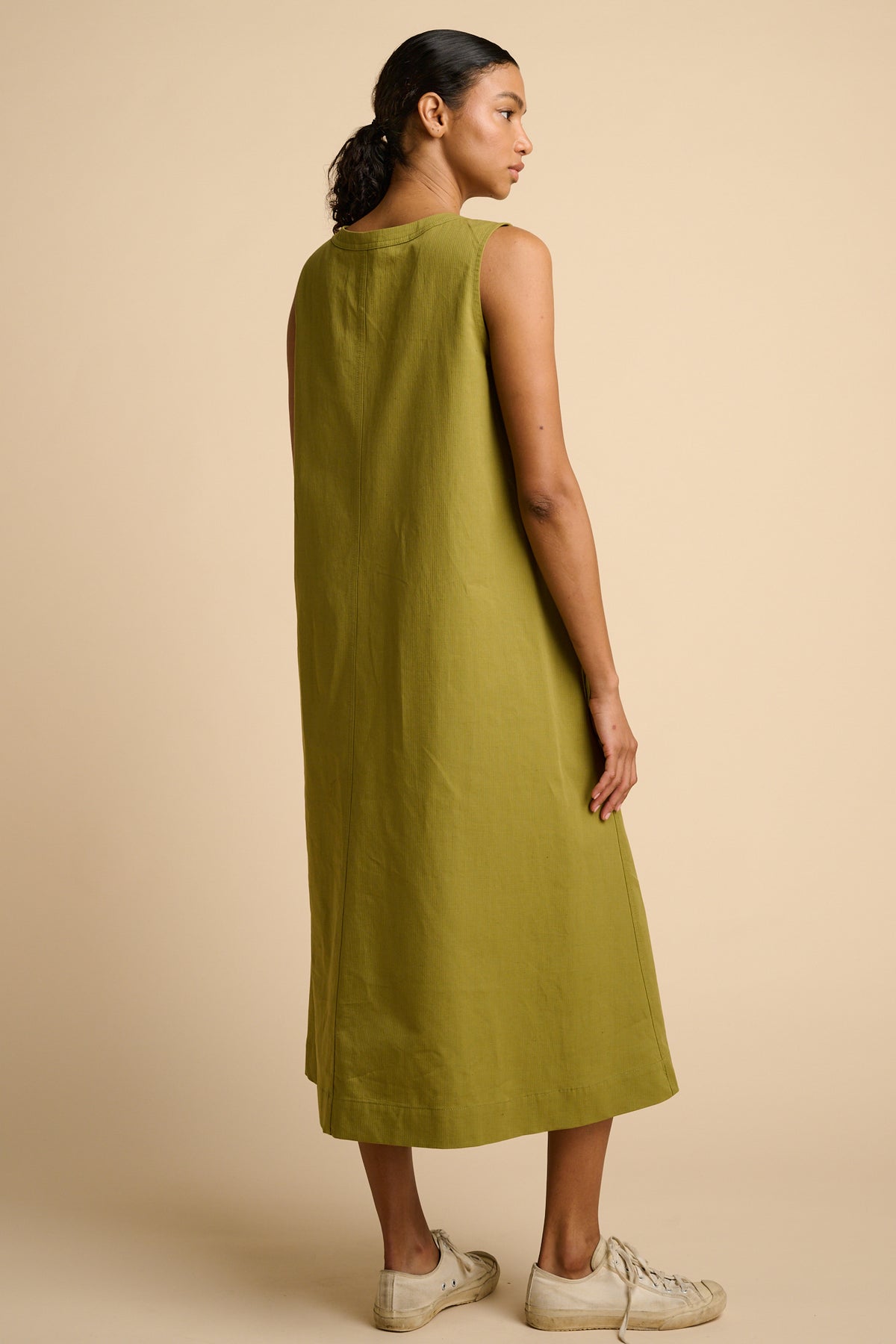 Woman in green maxi dress.