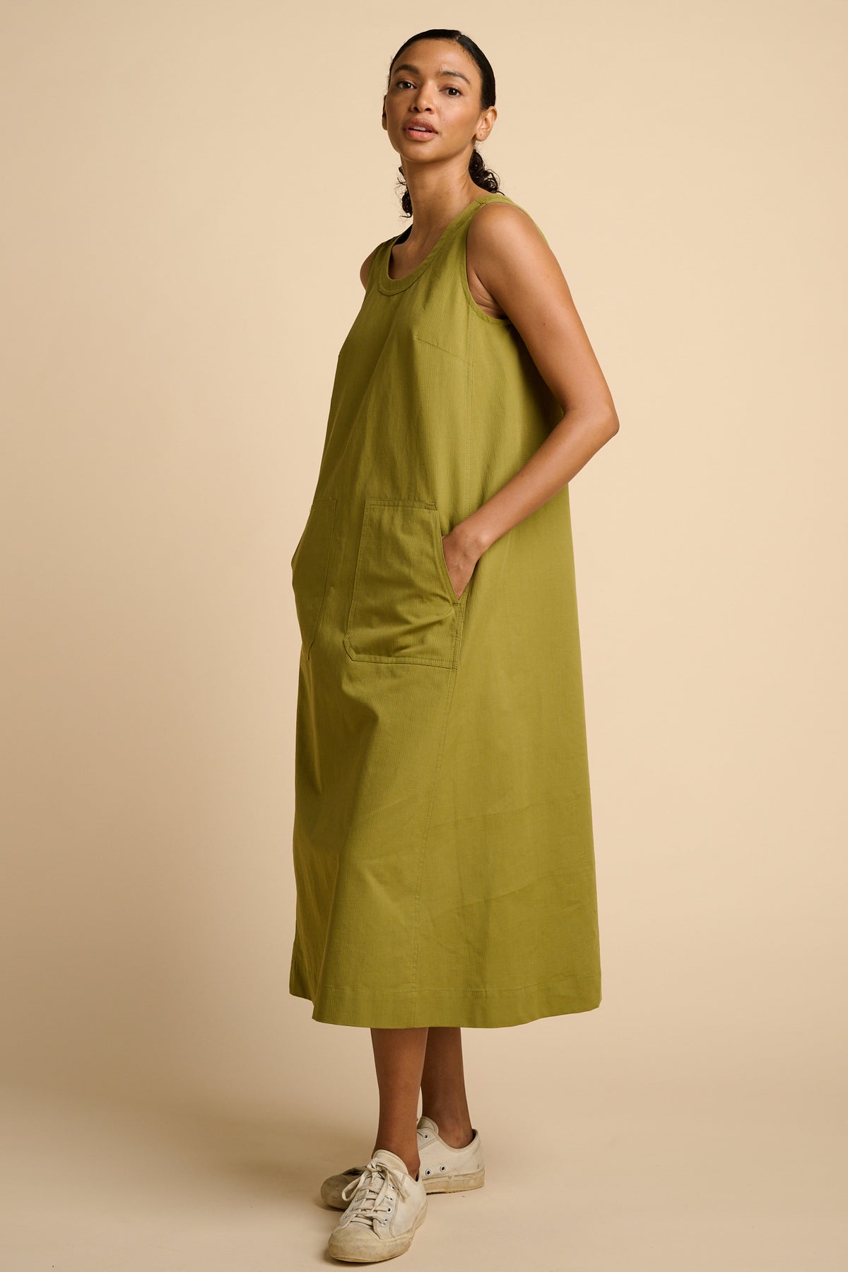 Woman in green maxi dress.