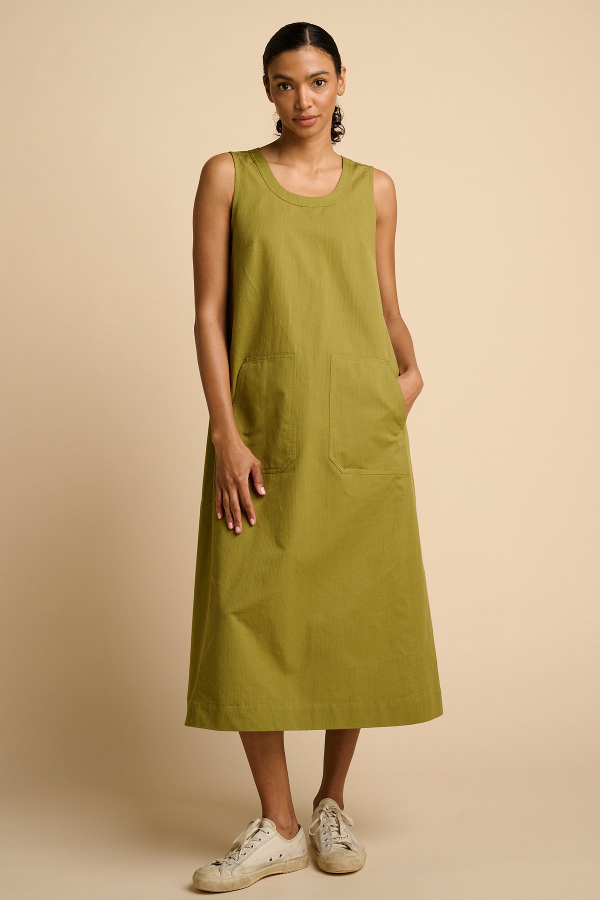 Woman in green maxi dress.