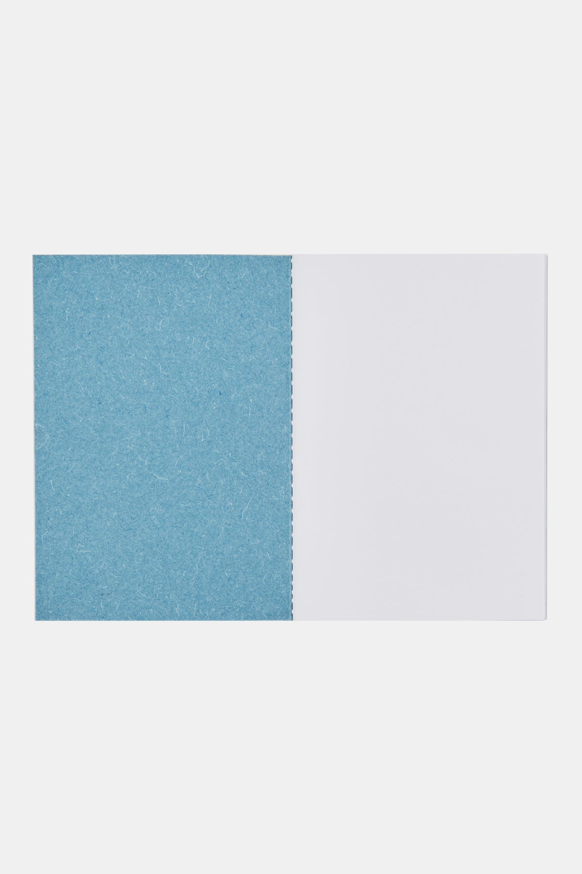 The front page of A5 recycled denim notebook in blue with 48 plain pages