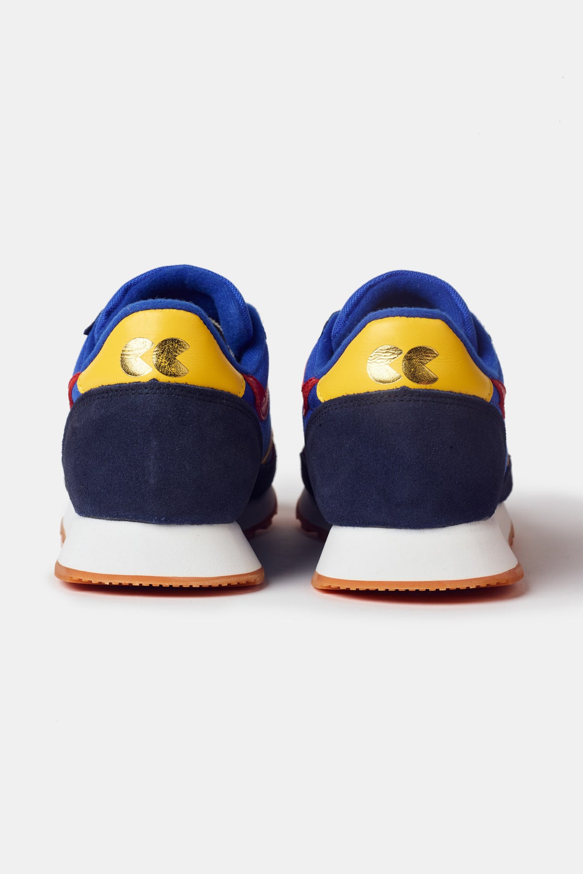 Men's beacon trainer in blue showing blue and yellow heal CC Logo 