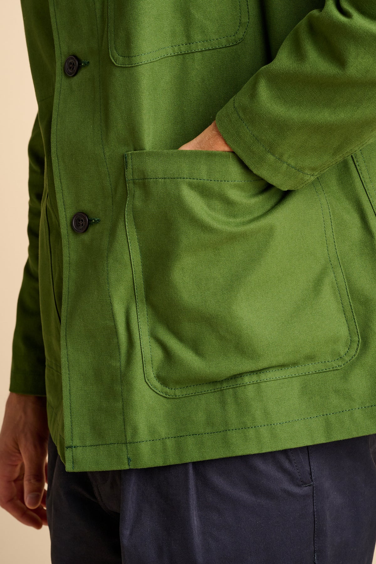 Man wearing green chore jacket.