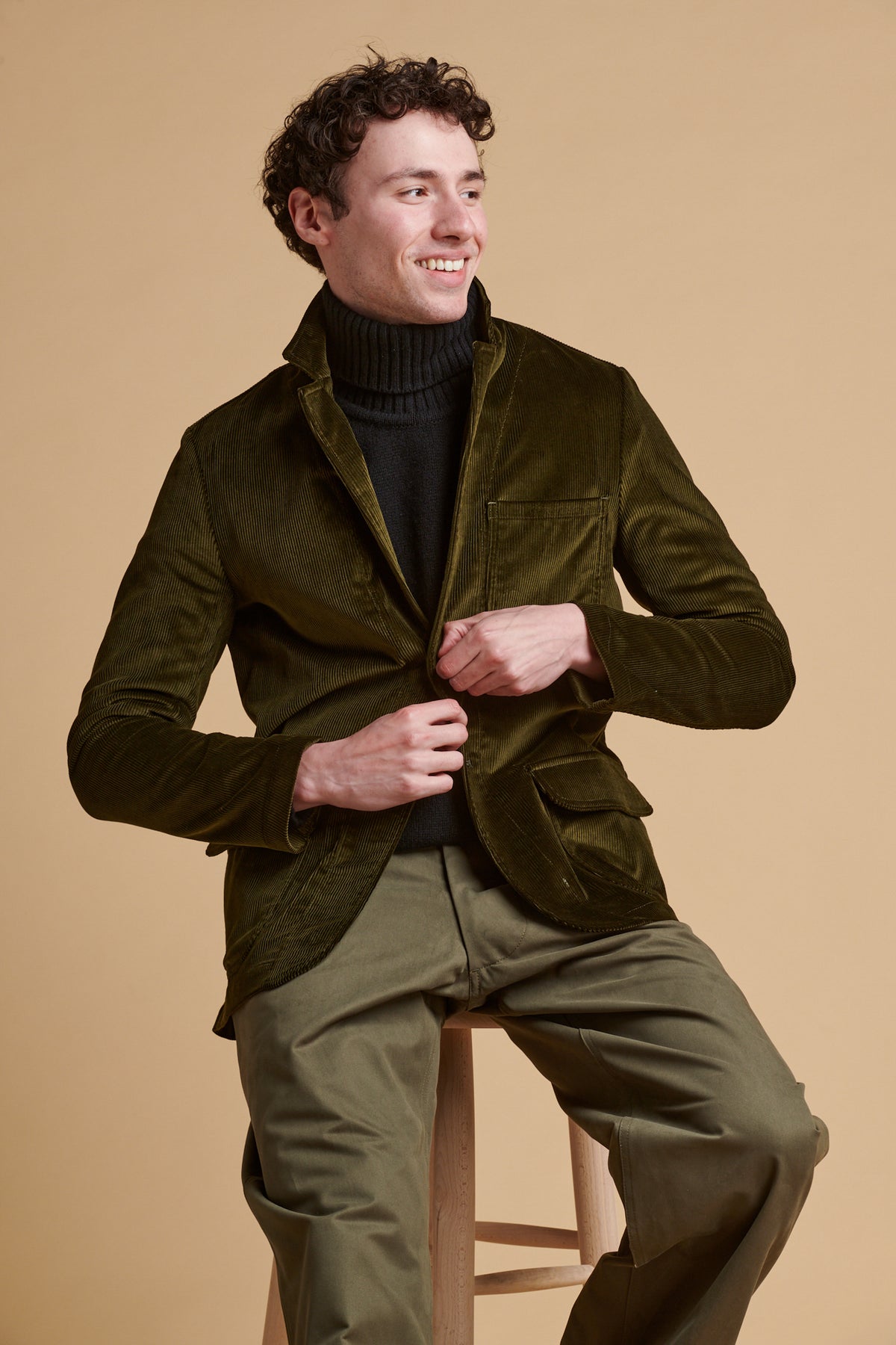 Male wearing James single breasted corduroy blazer in olive.