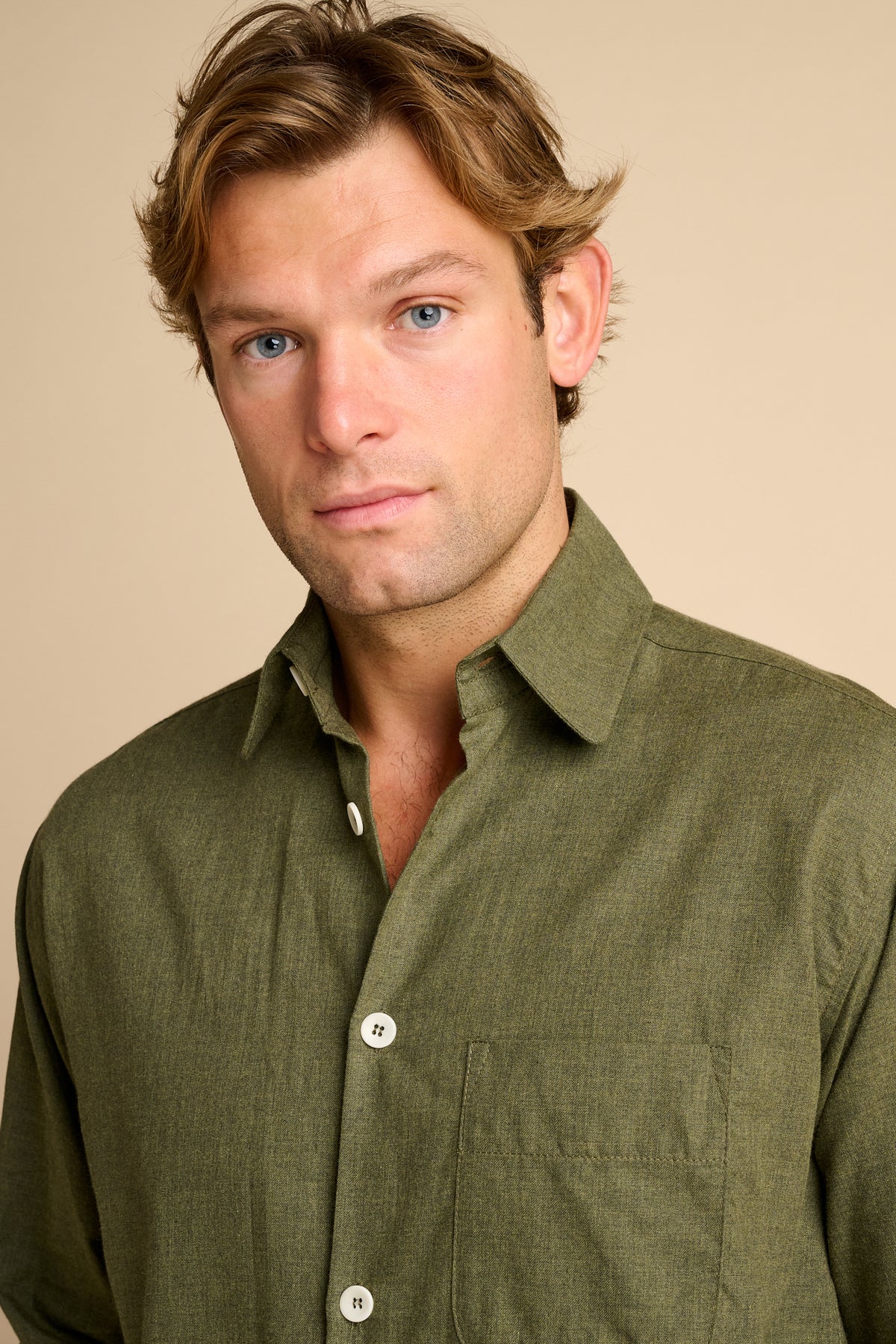 Man wearing green shirt.