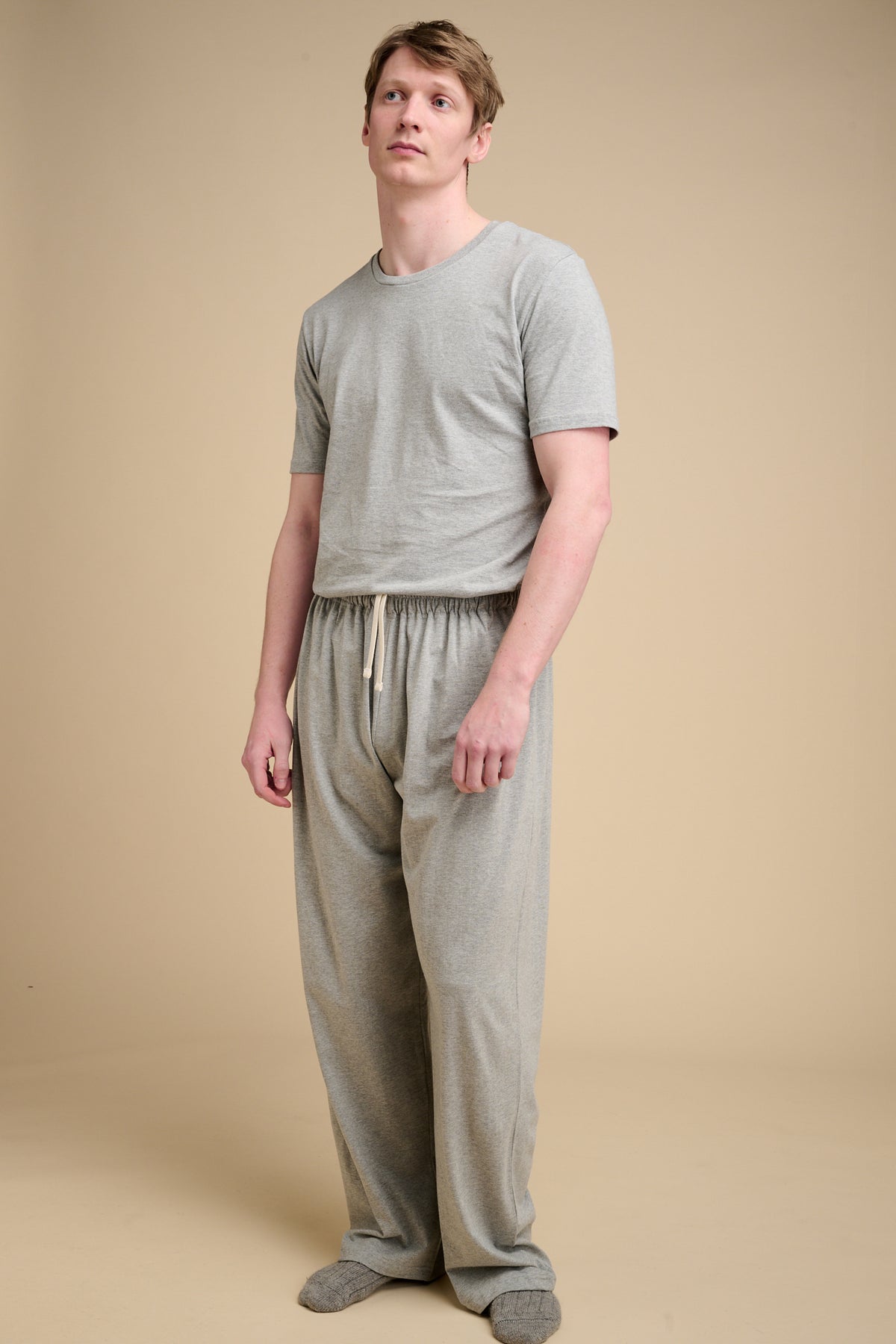 Male wearing grey marl pyjamas