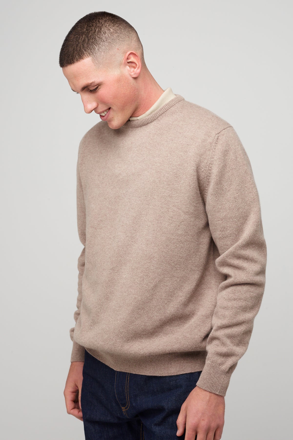 brunette, white male in taupe lambswool crew neck 