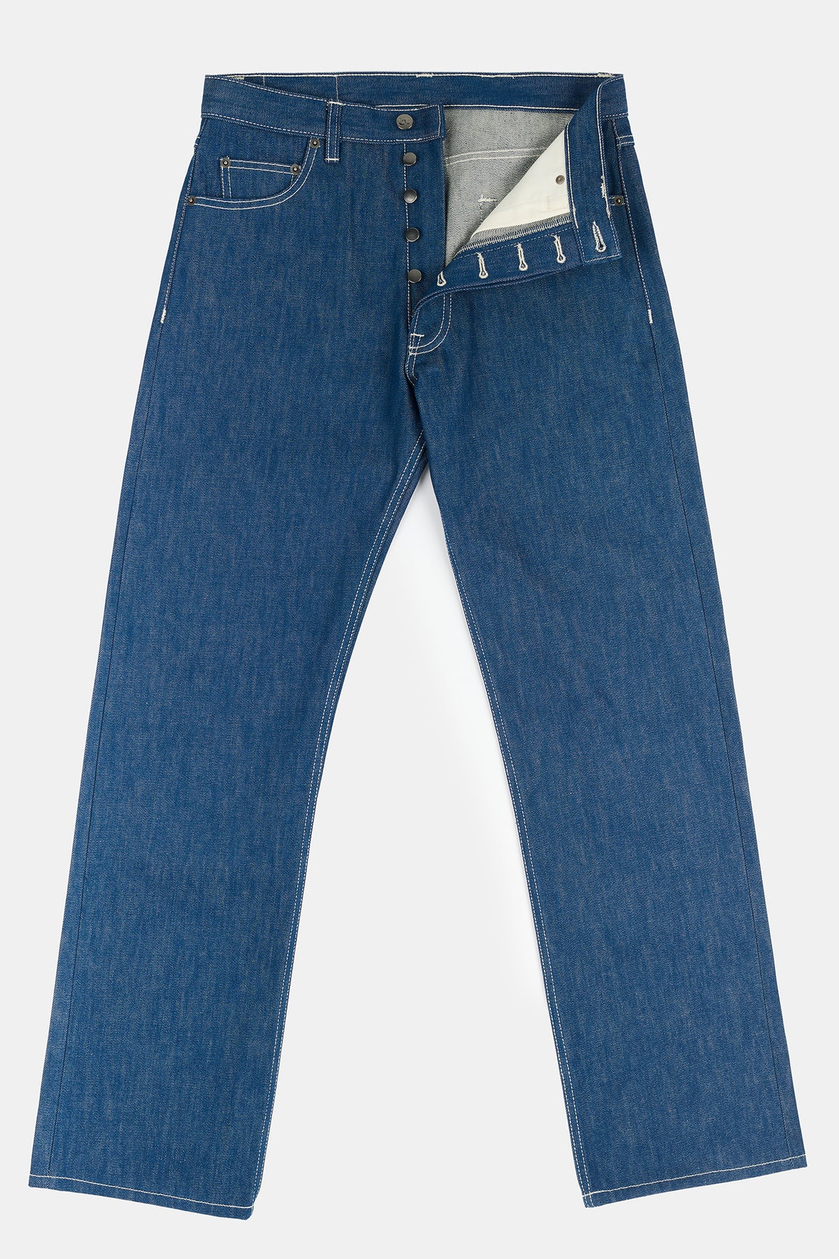 Flatlay product image of men's loose fit button fly Arun jean in blue