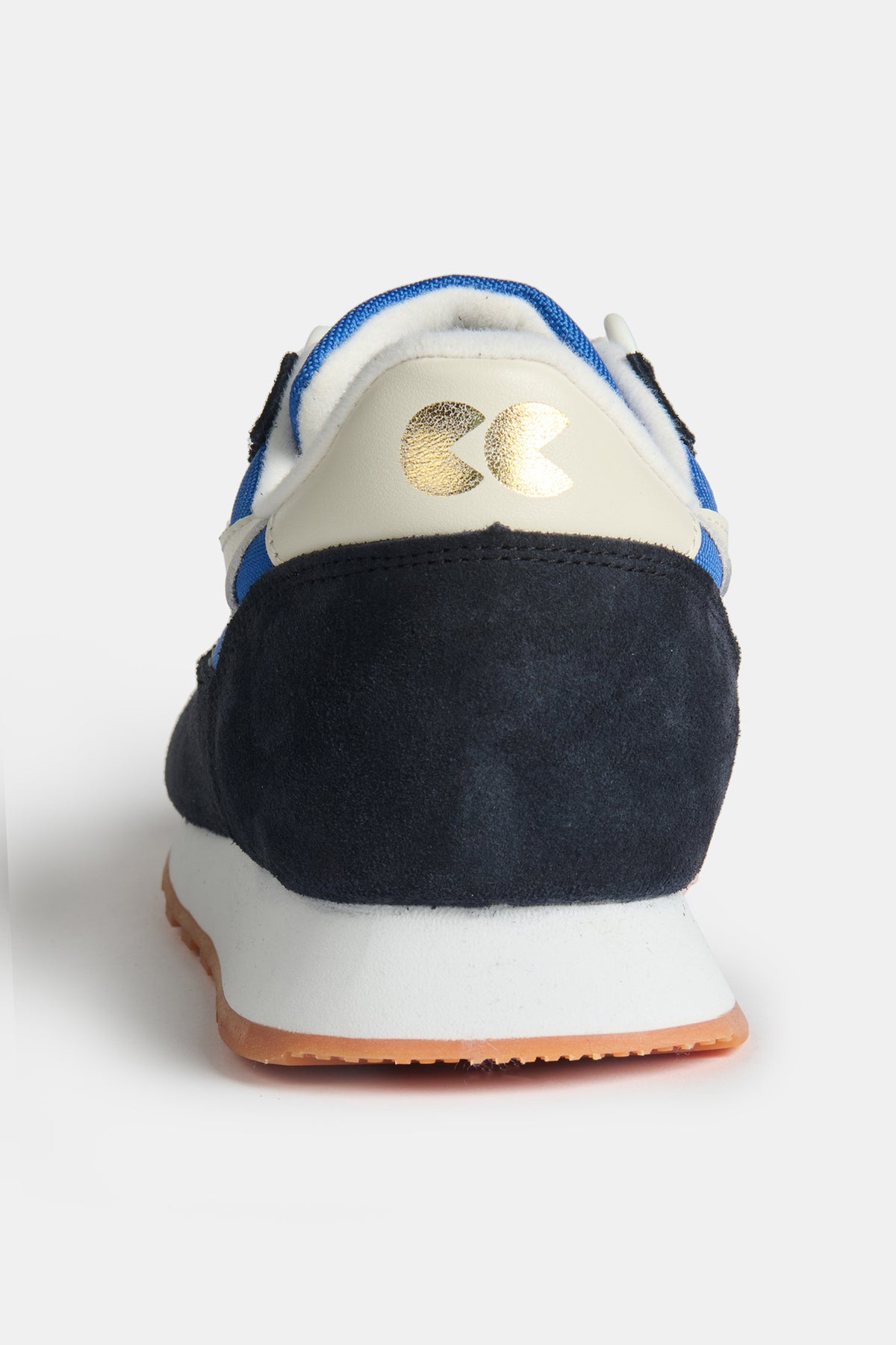 The heel of men's Parlick trainer in blue, navy and off white with CC gold foil logo