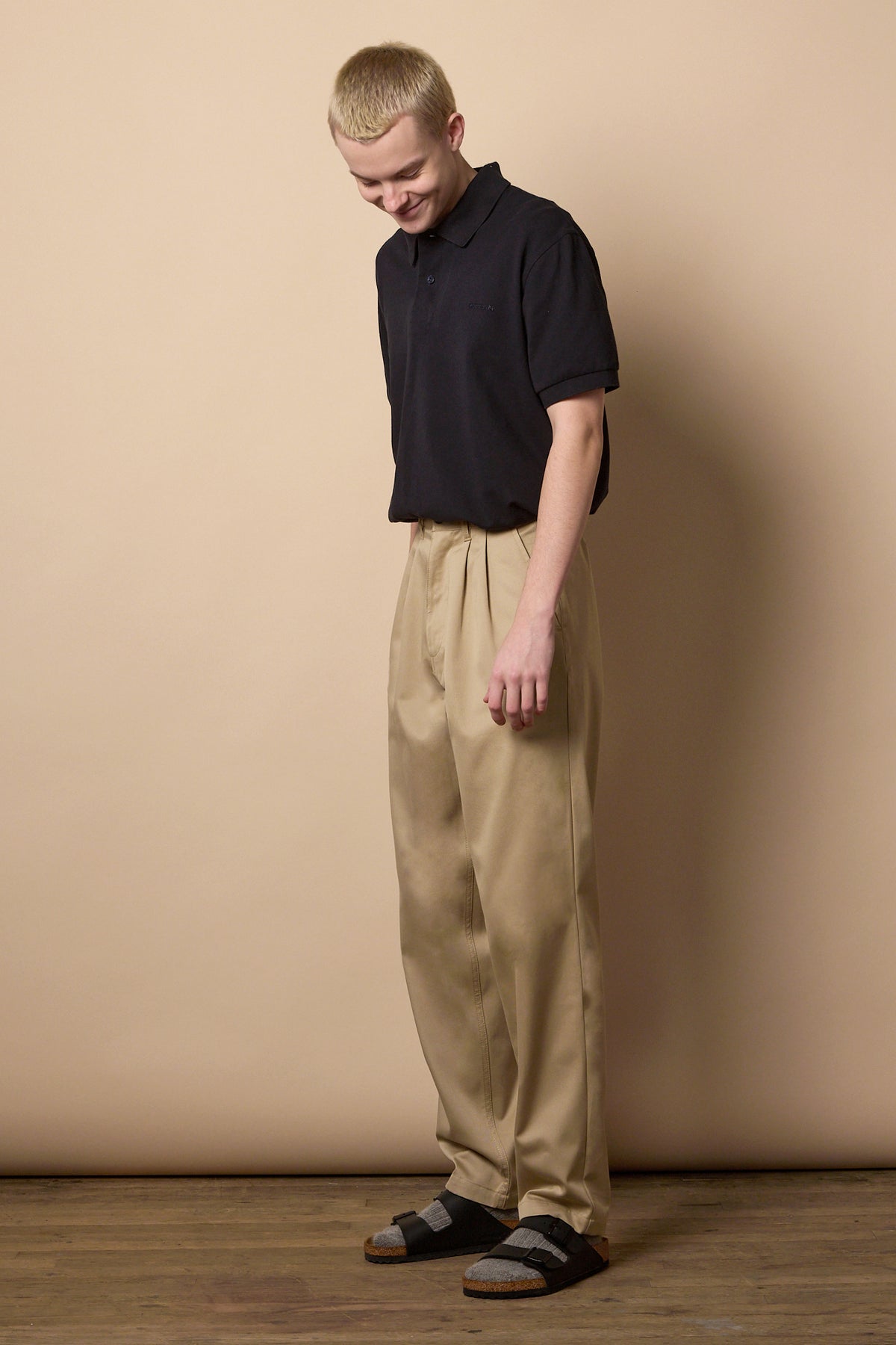 Full body image of pleated chino in stone 
