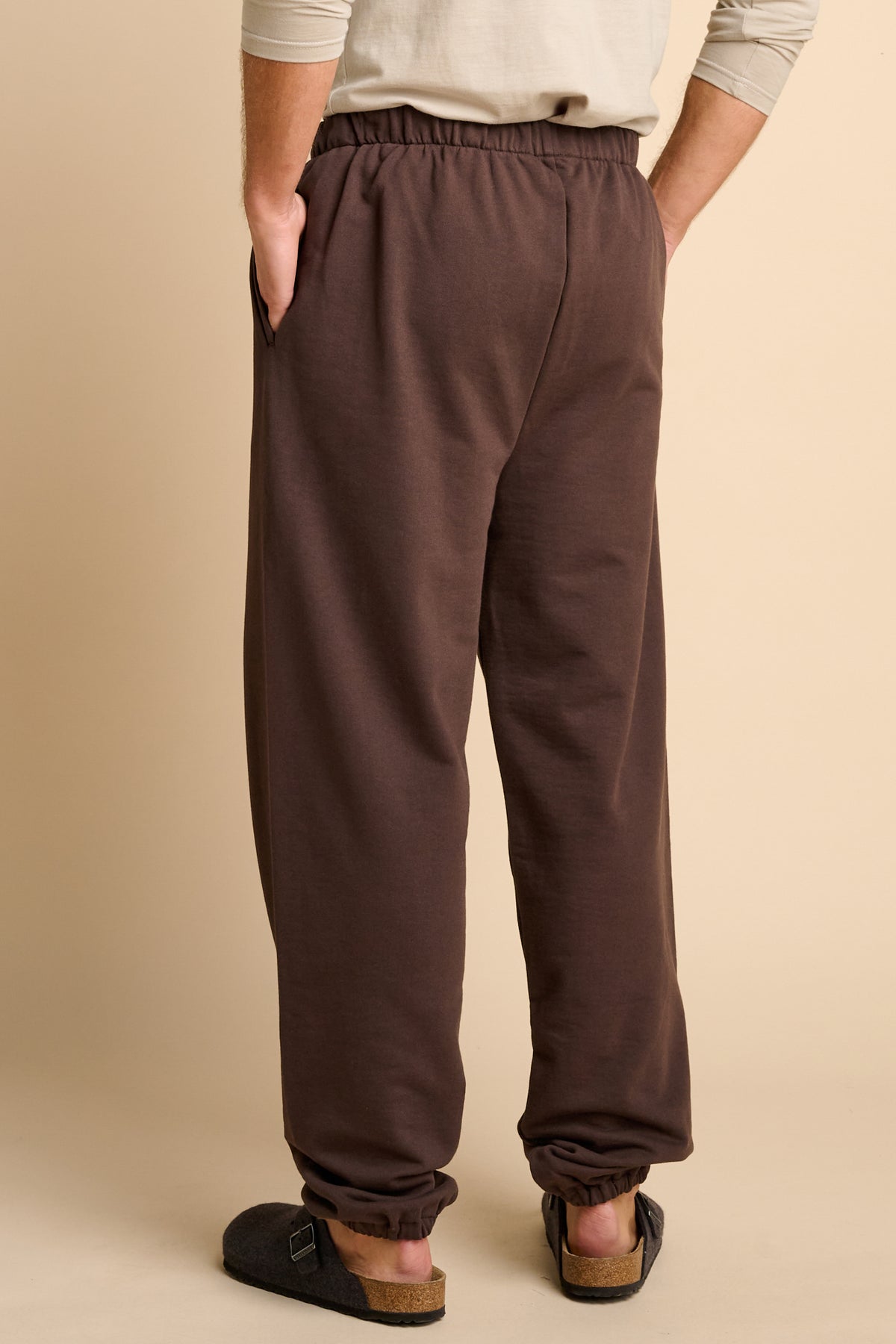 Man wearing chocolate brown sweatpants.