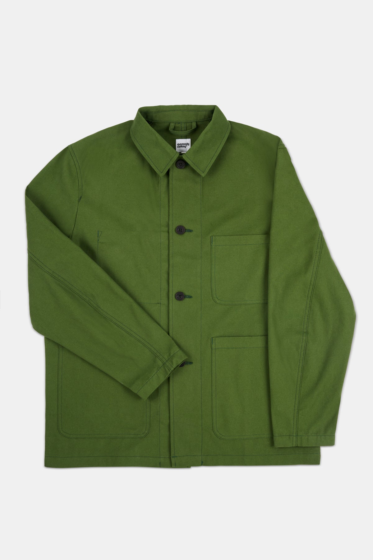 Green jacket with black buttons on a white background