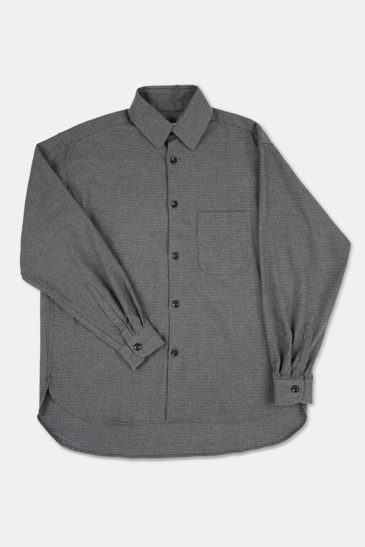 Grey shirt with long sleeves on a white background