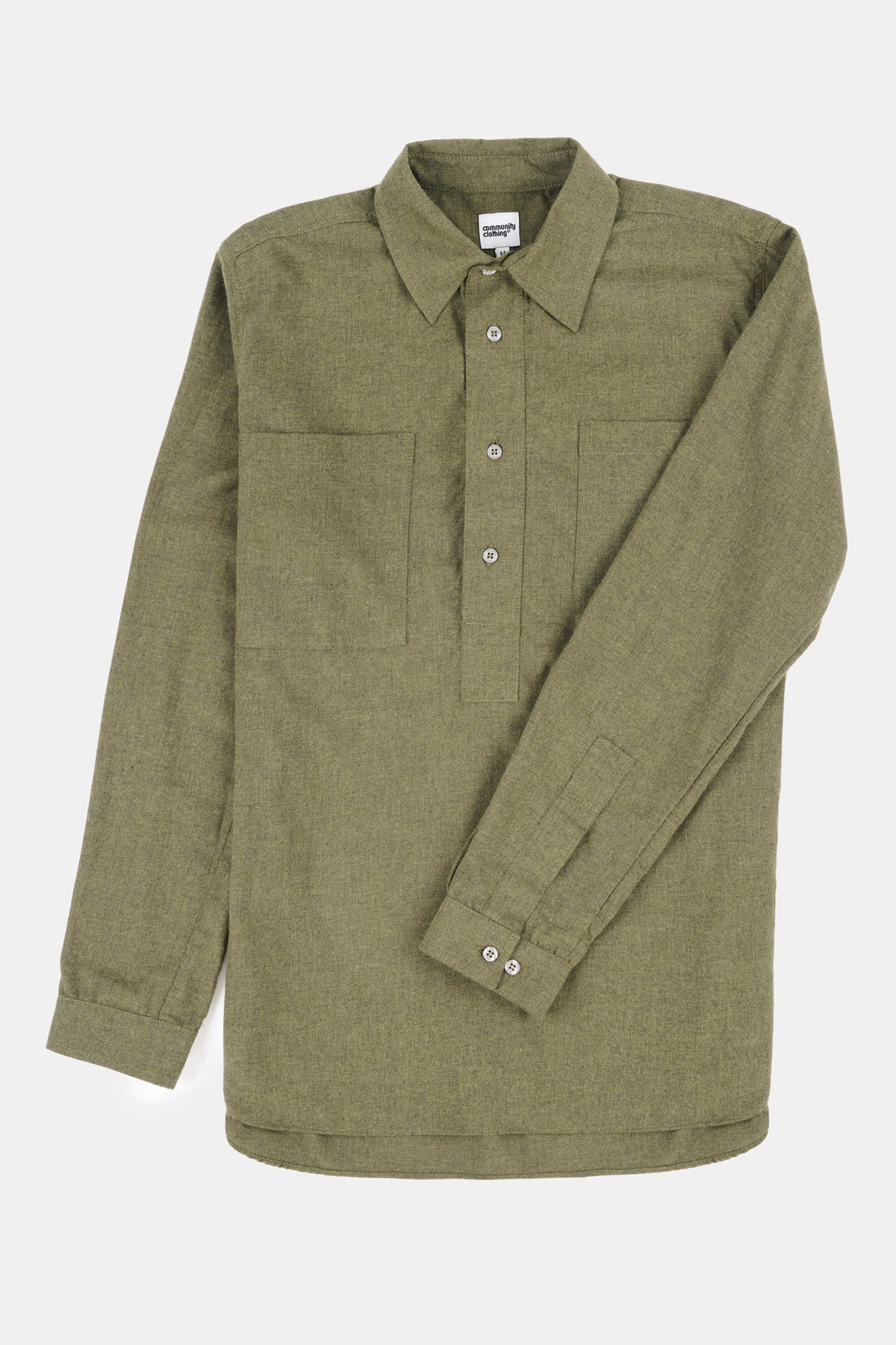 Green shirt with long sleeves on a white background