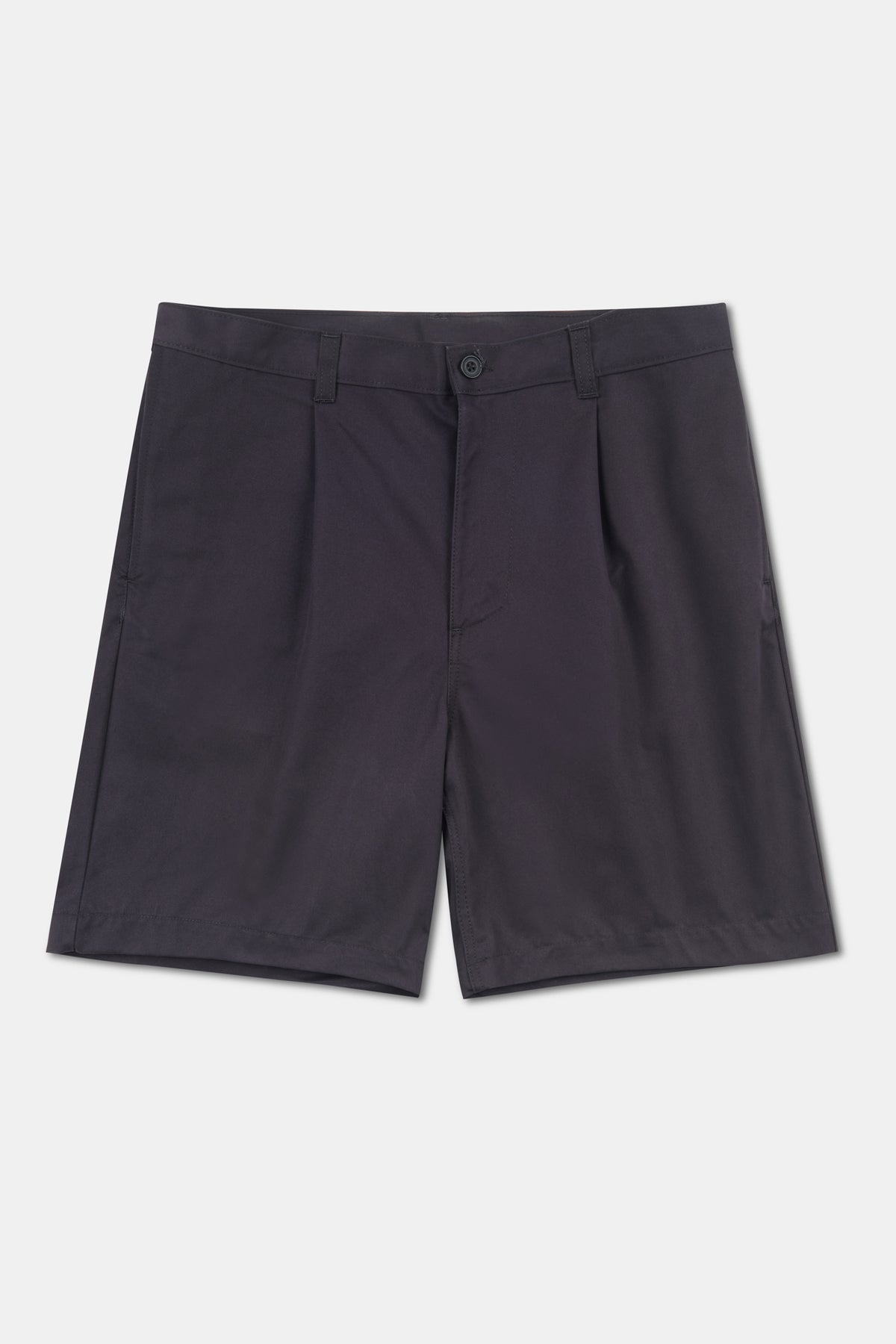 Navy pleated shorts on pale grey background.