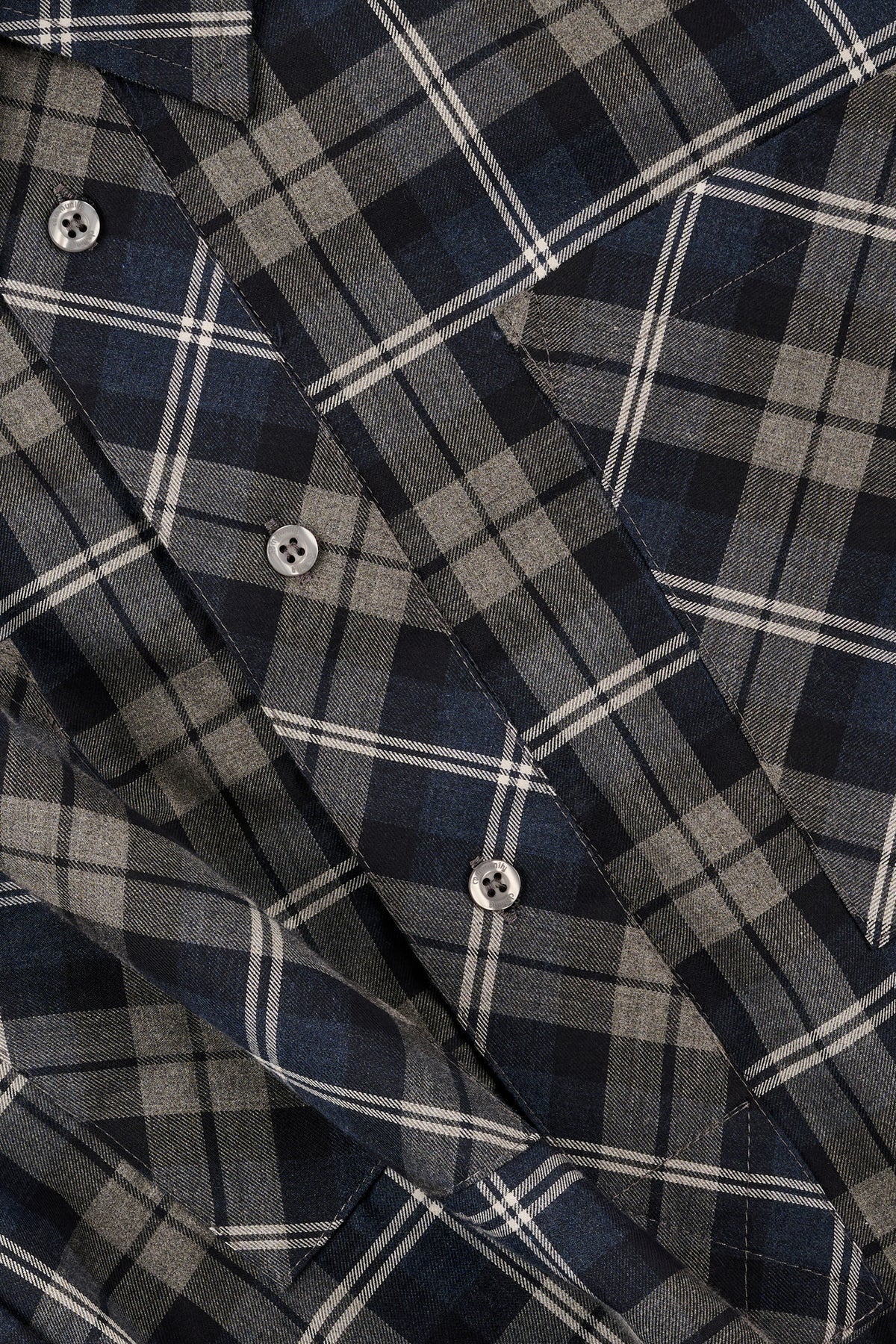 Close up of blue mixed check shirt