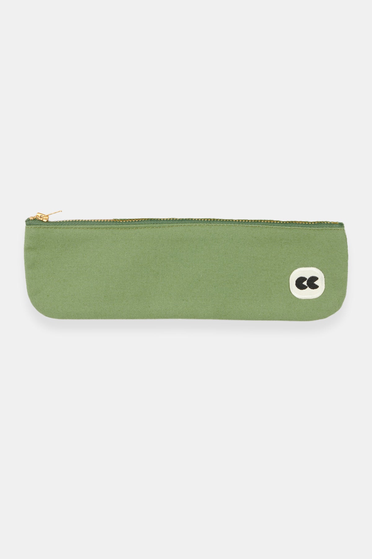 Pencil case in sage with black CC logo patch flatlay