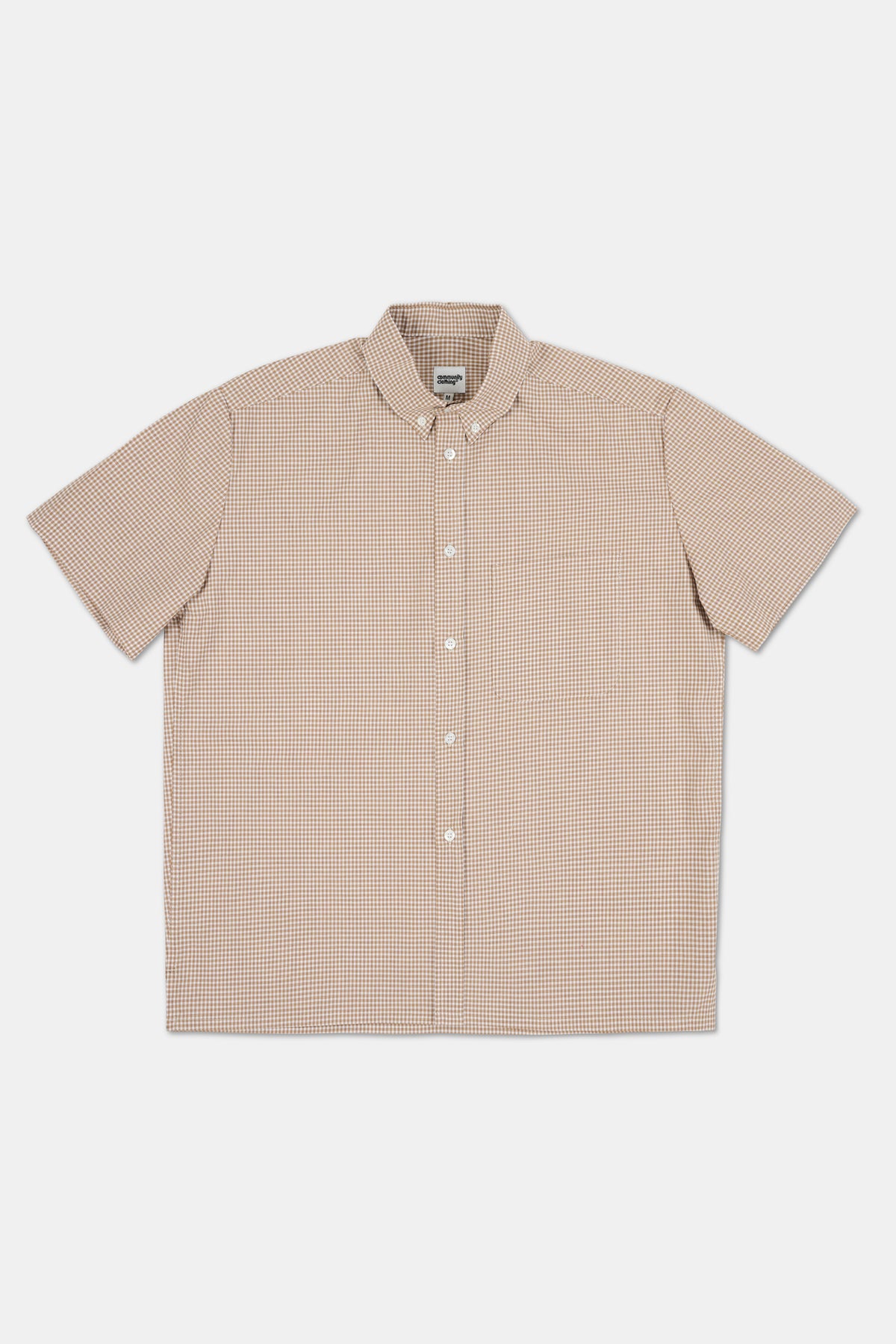 Beige checkered shirt on a white background