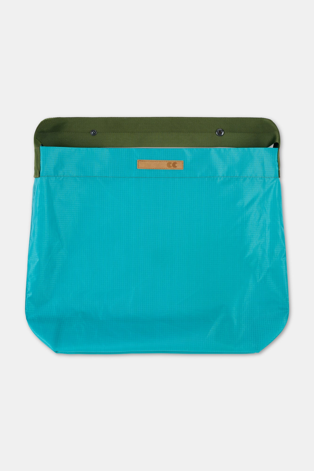 Teal bag with green strap on a white background