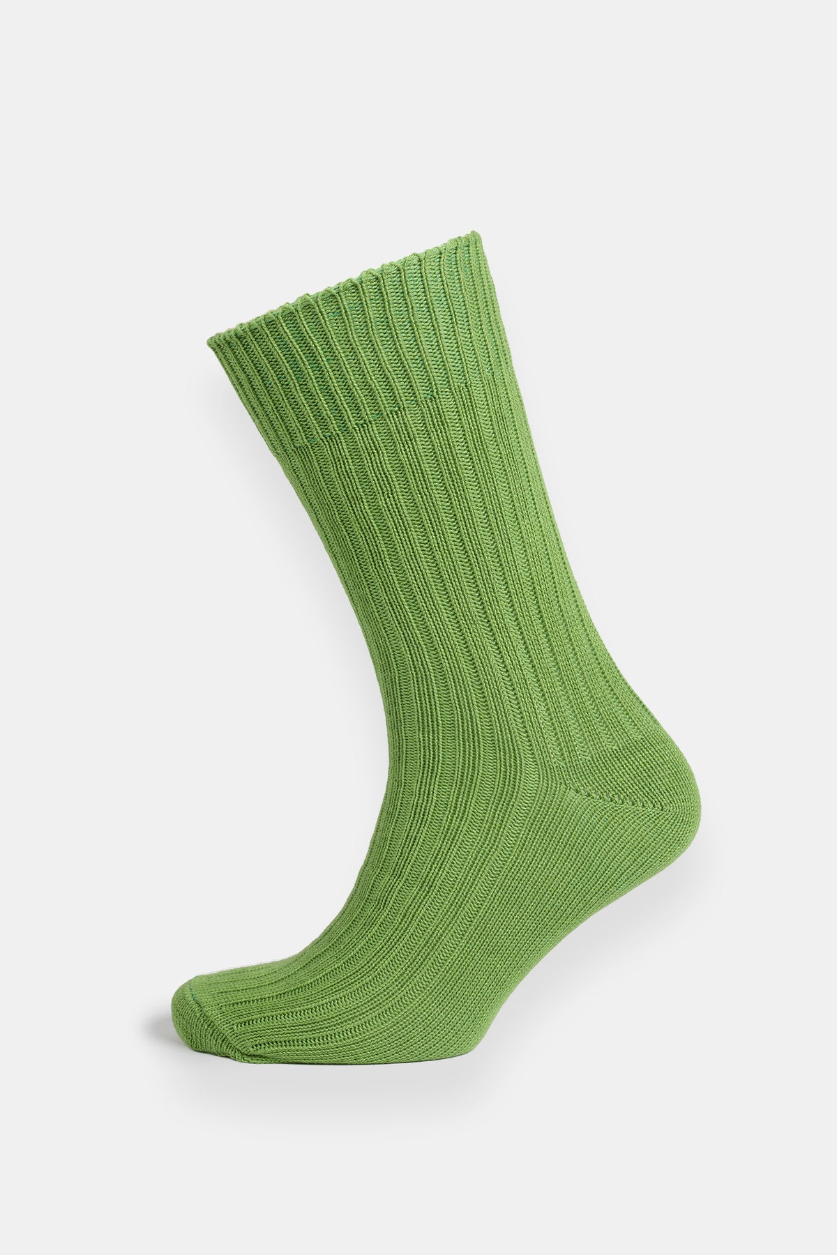 Green sock on a white background