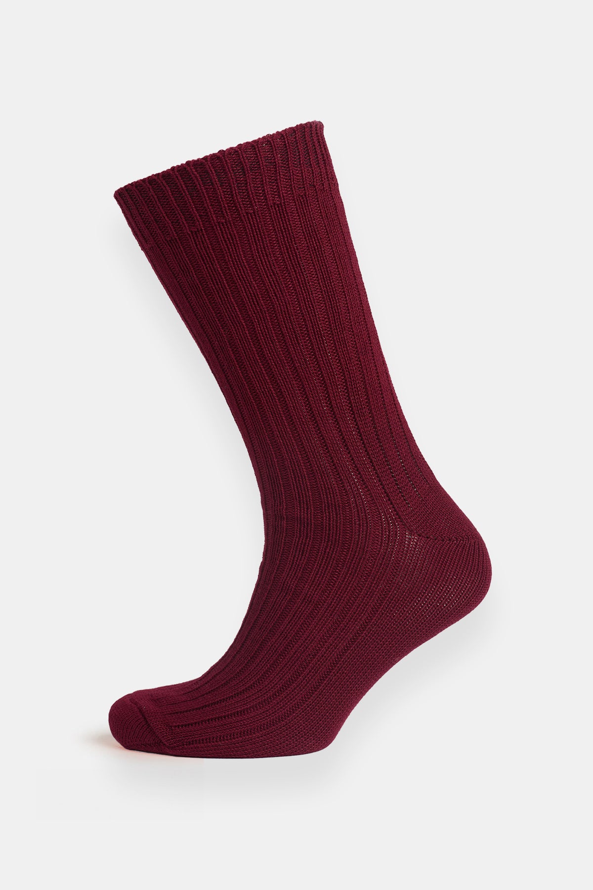 Burgundy ribbed sock on white background