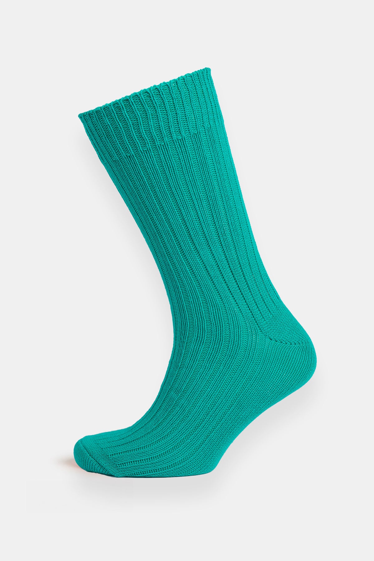 Teal ribbed sock on a white background
