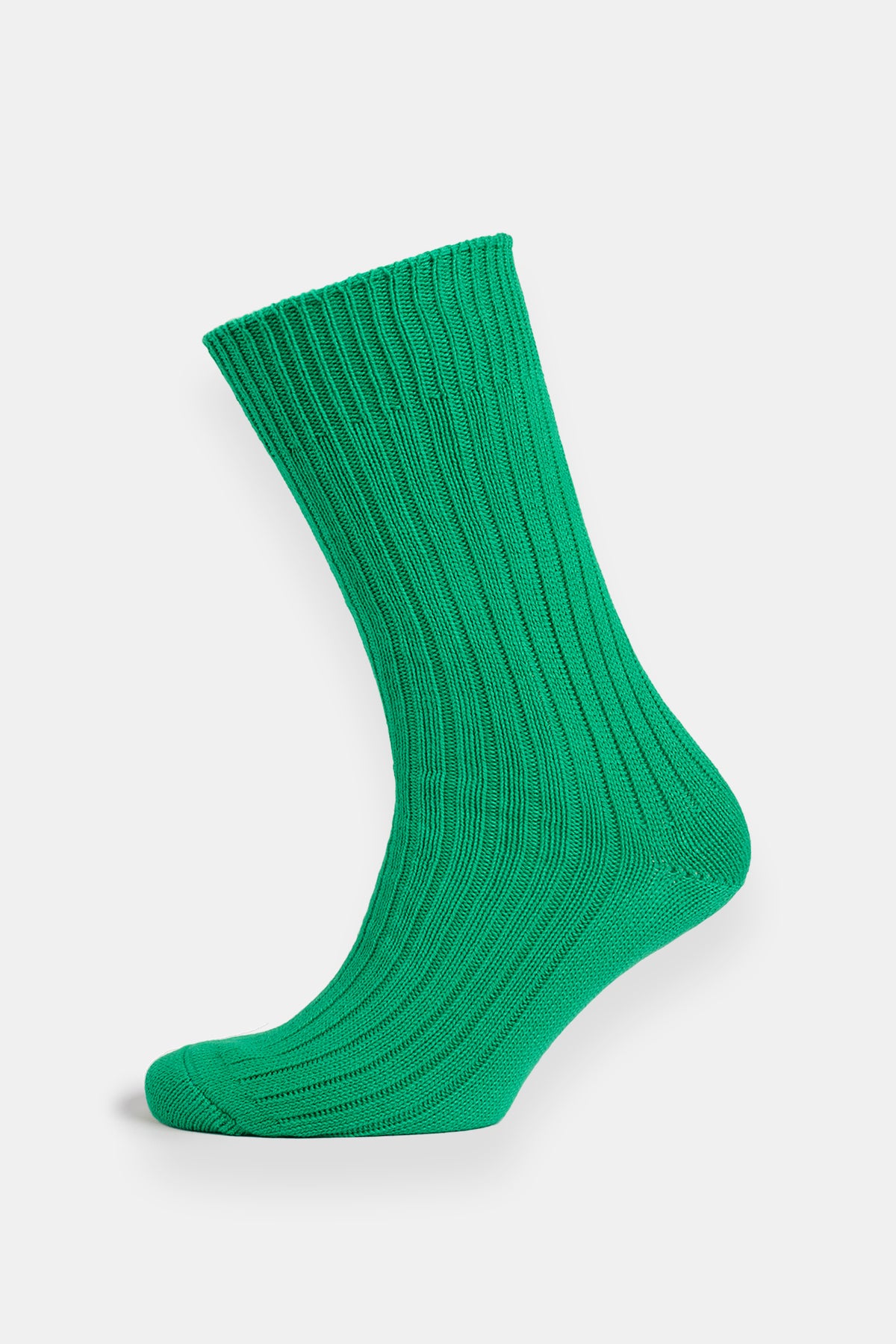 Green sock on a white background