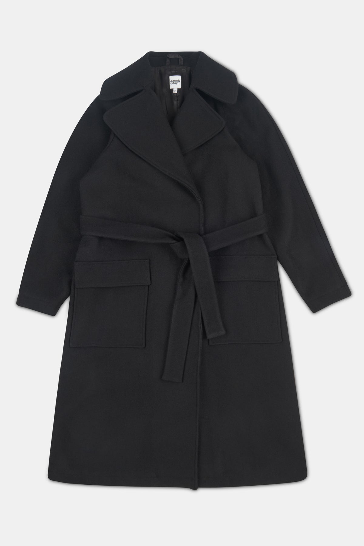 Black coat with a belt on a light gray background